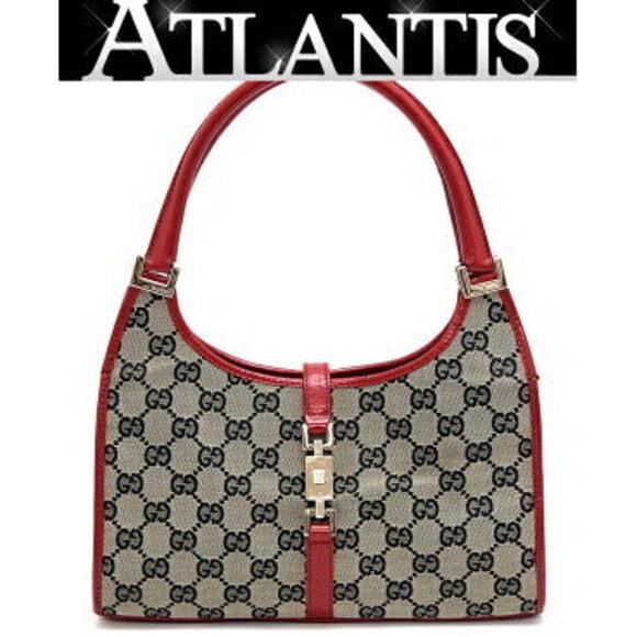 Gucci Handbags - Gucci Jackie handbag GG red